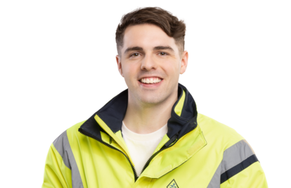 Bild von einem Vermesser Junger lachender Mann mit Vermessungsplan in der Hand